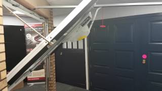 Canopy garage door with Liftmaster LM80EVS and 1703REV convertor arm [upl. by Toole]