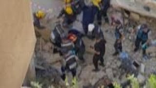 Jordanian rescuers find survivor in collapsed building [upl. by Enalda986]