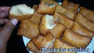 HOW TO MAKE CINNAMON  CARDAMOMS HALF CAKE SOFTSWEET MANDAZI  mandazi ya iliki [upl. by Aliled384]