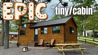 WOW a tiny house log cabin in a CLASS by ITSELF Tiny Home Tour [upl. by Enelaehs]