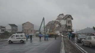 Chinese house in middle of road demolished [upl. by Theron]