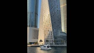 Amazing view of Dubai marina the cayan tower and the beautiful Yatch dubaicity marinabeach [upl. by Llerud513]