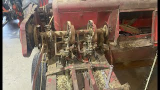 Working On The Knotter Brake and Feeder Tines On The New Holland 68 Baler balinghay bananabales [upl. by Lampert921]