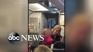 More details on American Airlines flight attendants confrontation with passengers [upl. by Berke400]