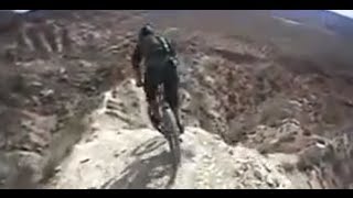 Inches from Death Downhill mountain biker rips cliffs in Utah [upl. by Atilrac]