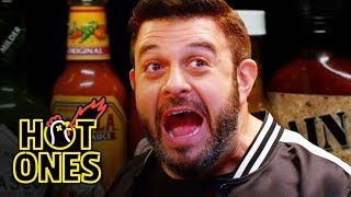 Adam Richman Fanboys Out While Eating Spicy Wings  Hot Ones [upl. by Adnal]