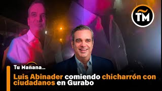 Luis Abinader comiendo chicharrón con ciudadanos en Gurabo [upl. by Anelram]