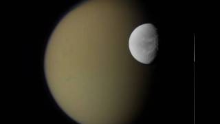 Saturns Moons Dione and Titan from Cassini [upl. by Notgnirra]