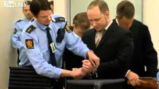 Anders Breivik salutes as he arrives in court [upl. by Aimar]