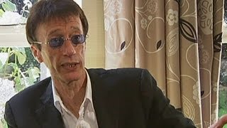 Bee Gees singer Robin Gibb talks about his early musical career [upl. by Eibbil393]