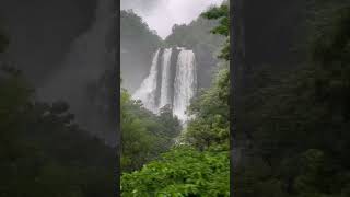 Mandovi express crossing beautiful Ukshi Waterfall [upl. by Ttcos]