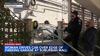 Woman drives off edge of Norridge shopping malls parking garage flipping car officials [upl. by Steere27]