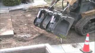 DEMODOZER SKID STEER GRAPPLE ATTACHMENT  UNBELIEVABLE CONTROL [upl. by Clapper]