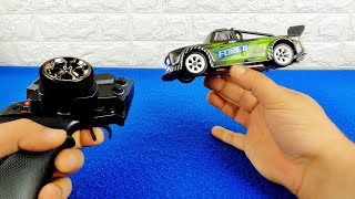 Unboxing Wltoys 284131 Scale 128 24G New 4WD Mini Rc Cars Drift RC With Light Kit [upl. by Repsaj]