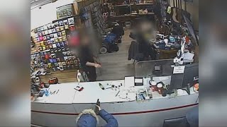 Brazen robbery of Winnipeg pawn shop caught on camera [upl. by Stefan420]