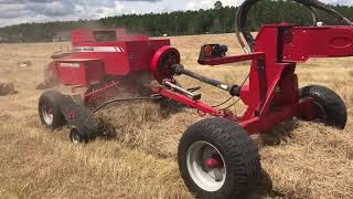 Massey Ferguson 5710 pulling twin balers [upl. by Ilojne]