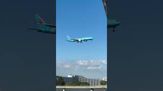 China Eastern B777300ER landing at JFK Airport seen from the AirTrain [upl. by Lust183]