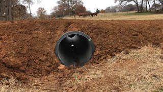 INSTALLING A 20FOOT CULVERT PIPE  BRIDGING THE CREEK [upl. by Anivla95]