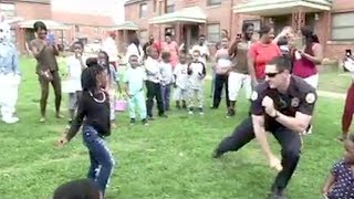 Watch Police Office Challenge Residents To DanceOff While On Patrol [upl. by Ellehctim]