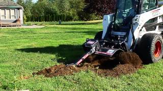 Bradco Trencher Attachment for Skid Steer Loaders  Overview and Demo [upl. by Eniladam]