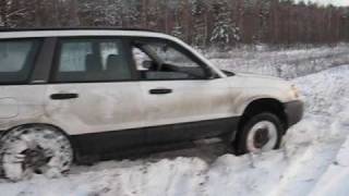 Subaru Forester in snow get two wheels off the ground [upl. by Adalia330]