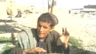 An Afghan villager praises Taleban commander Mullah Dadullah in a song somewher in Afghanistan [upl. by Ellennad]