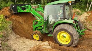 John deere 4066r digging a white tail watering hole [upl. by Wier]