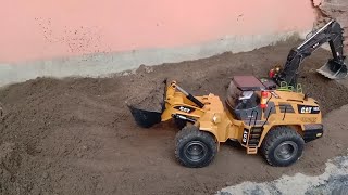 RC Bulldozer Wheel Loader CAT Huina 1583 Working On Leveling The Land  BangSiagianID [upl. by Sellihca558]