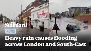 Heavy rains cause flooding and transport chaos across London and surrounding areas [upl. by Sikram141]