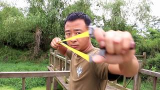 Amazing skills slingshot master extreme accuracy slingshot shooting [upl. by Hairej731]