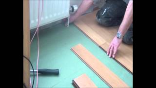 Part 3 Complete Click Floor Installation Fitting around radiator pipes [upl. by Lili328]