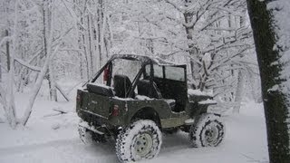 Willys Jeep cj2a playing in the snow [upl. by Nnaeirrac]