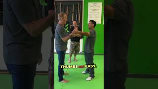 Simple SelfDefense Techniques Targeting the Thumbs selfdefense shorts [upl. by Essined346]