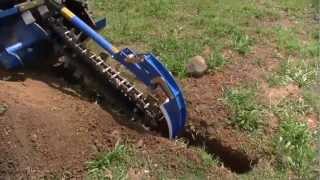 Auger Torque MT900 Trencher on Kubota SVL75 [upl. by Pages]