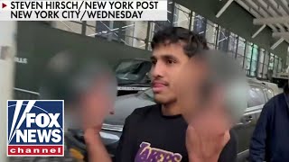 Illegal migrants in violent NYPD attack give middle finger after release [upl. by Terza]