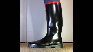 shiny black wellies boots on feet with squeaking sounds shorts [upl. by Prebo]