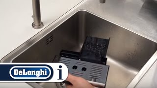 How to Clean the Drip and Condensate Trays of Your DeLonghi Autentica ETAM 29660SB [upl. by Anelim]