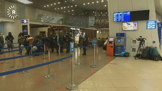 Migrants wait at Minsk airport before first Iraqi repatriation flight  AFP [upl. by Euginimod]