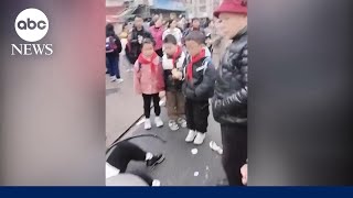 Children injured as car crashes into primary school in China [upl. by Sup198]