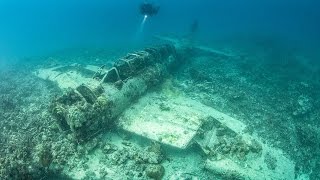 pictures Ghostly ocean floor graveyard of hundreds of ships and planes memorial for WWII [upl. by Dnumyar788]