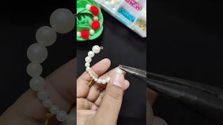 DIY cowrie shell earrings😱diyyoutubeshorts shortspearlearringsbeadedjewelrywireearrings [upl. by Haonam]