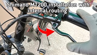 Shimano MT200 Hydraulic brakes installation with internal cable routing CBGarage [upl. by Johannes]