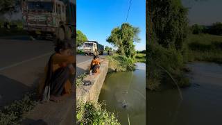 Village Woman Hook Fishing In Road Side Canal fishingmethods hookfishtrap fishingtechniques fish [upl. by Gauthier356]