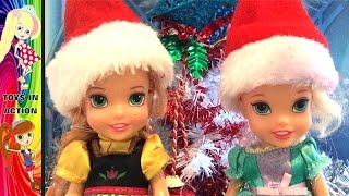 Anna and Elsa Toddlers Christmas Decorating The Christmas Tree  Christmas Carols  Toys In Action [upl. by Idrahs]