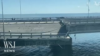 Ukraine Strike Damages Key Bridge Linking Crimea to Russia  WSJ News [upl. by Nivra]