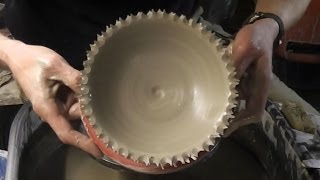 Throwing  Making a torn ragged rimmed pottery bowl on the wheel [upl. by Eiluj]