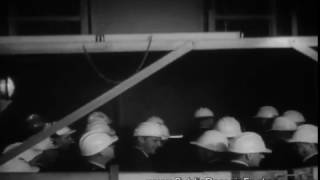 Construction company executives descending elevator 1950s archival footage [upl. by Norford14]