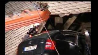 Germany Car Crashes Through Church Roof [upl. by Allemaj961]