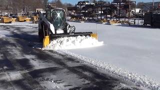 SnoWay Adjustable wing plow on a skid steer [upl. by Irrej]