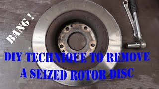 Free a seized rotor brake disc DIY [upl. by Enilorac]